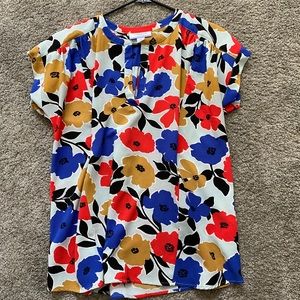 Motherhood hidden side zipper nursing blouse.